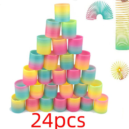 24PCS Rainbow Magic Springs Circle Toys Kids Birthday Party Favors Guests Giveaway Small Gifts Pinata Fillers Flexible Funny Toy